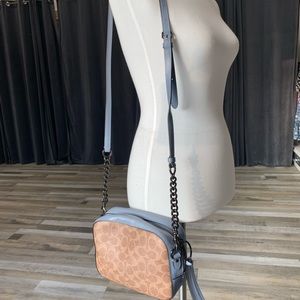 Light blue crossbody Coach purse